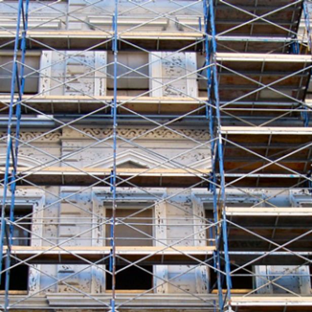 Building set up with scaffolding allover